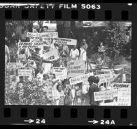 Korean Americans carrying signs protesting Korean Air Lines Flight 007 downing, Long Beach, Calif., 1983