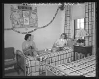 UCLA seniors, Louise Haggard and Gloria Jones in their dorm room in Hershey Hall, 1948