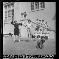 Eleven students modeling old and new gym uniforms at the all girl Marlborough School in Los Angeles, Calif., 1964