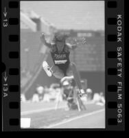 Face on view of Jackie Joyner mid-jump during the 1984 U.S. Olympic trials in Los Angeles, Calif.