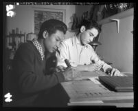 Miguel Ungson and Alfredo Santa Cruz  wood carving at Spanish-American Institute in Gardena, Calif., 1954