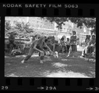 Susan Kirby performing juggling act at Pershing Square in Los Angeles, Calif., 1984