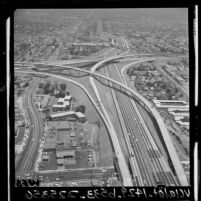 Aerial view of completed San Diego Santa Monica Freeway interchange and surrounding area, 1964