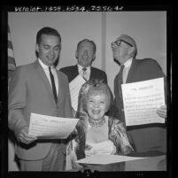 Vivian Duncan singing with Councilmen James B. Potter Jr., John P. Cassidy and Mayor Samuel W. Yorty for Los Angeles' 183rd birthday, 1964