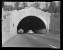 Know Your City No.79 Automobiles going through entrance of Figueroa Street tunnels on the Pasadena Freeway, Los Angeles, 1956