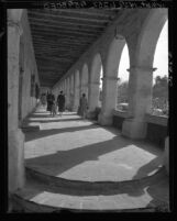 Know Your City No.109 Women and child walking the arcade of the San Fernando Mission, San Fernando, Calif.