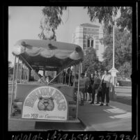 UCLA students boarding campus Bruin Bus tram, 1965