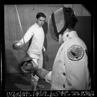 Fencer Carl Borack training with instructor for the World Junior Fencing championship, 1965