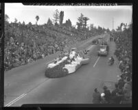 Rose Queen Virginia Goodhue and her court riding in Rose Parade in Pasadena, Calif., 1948