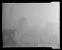 View of part of the Los Angeles Civic Center masked by smog in 1948