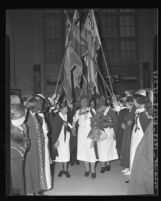 Flags raised over returning evangelist Aimee Semple McPherson, Calif., 1939