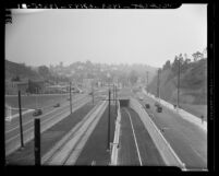 Cahuenga Pass Freeway, view looking south to the junction of Cahuenga and Highland Aves in Los Angeles, 1940