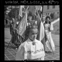 People dressed in various Eastern European ethnic costumes at Los Angeles City Hall for Captive Nations Week ceremony, 1965
