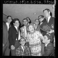 Comedienne Phyllis Diller being awarded honorary house mother of Alpha Epsilon Pi Fraternity at UCLA, 1966