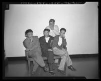 Four Japanese Americans arrested for conducting meeting in Japanese while at Santa Anita Assembly Center, 1942