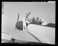 Aviatrixes WNAA members Georgia Burkett, Edna Sumner and Jennie Ashworth with monoplane in Los Angeles, Calif., 1946
