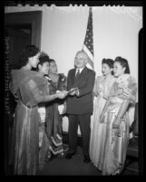 Mayor Fletcher Bowron with five women from various Filipino organizations in Los Angeles, Calif., 1945