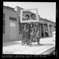Rosanna Wright, modeling African inspired clothing, at her clothing shop Bootstrings in Los Angeles, Calif., 1967