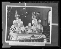 Copy of photo of Esia Bruskoff, Michael Levit, Michel Hellman and Abraham Davidson carrying Torah prepared for Yom Kippur, 1938
