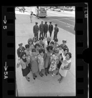 Group portrait of seventeen U.S. Air Force women enlistees and recruiters in Los Angeles, Calif., 1968