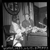 Maharishi Mahesh Yogi and Los Angeles Mayor Sam Yorty at press conference, 1968