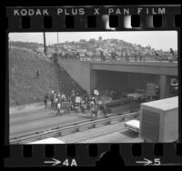 Anti-war demonstrators blocking traffic on San Bernardino Freeway near California State Los Angeles, 1970