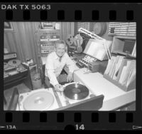 Radio host, Chuck Cecil in his home studio in Los Angeles, Calif., 1986