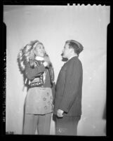 Navajo Chief D. A-So-See giving gesture of thanks to AMVET official Bill O'Sullivan in Los Angeles, Calif., circa 1945