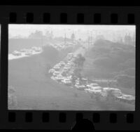 Traffic backed up on metered on-ramp for Hollywood Freeway, Los Angeles, Calif., 1970