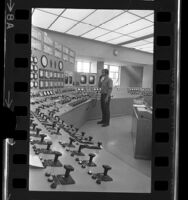 Worker in control room at the Haynes Steam Plant near Long Beach, Calif., 1970