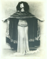 Ruth St. Denis, Salome, pre-1940 [posed against wall with dark shawl]