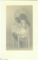 Ruth St. Denis, Studies personal, [seated at vanity mirror], circa 1899
