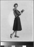 Black and white photographs of Cashin's designs of knit outfits for Guttman Bros.