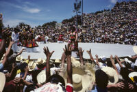Tehuantepec, performers throwing gifts to spectators, 1982 or 1985