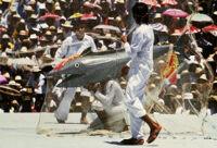 Tehuantepec, men carrying fake fish and casting net, 1985