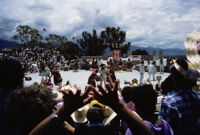 Juchitan, performers throwing gifts to spectators, 1982 or 1985