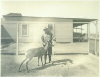 Man with deer at Unverisal City, Calif., 1915