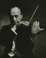 Jack Benny in tuxedo playing violin, half length portrait