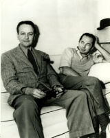 Raymond Chandler and Billy Wilder seated on couch on set of "Double Indemnity" [play], 1944