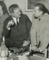 Kenneth Rexroth with unidentified man at gathering, candid snapshot