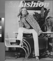 Oversized reprints of models wearing Cashin's fashion designs.