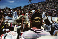 Macuiltianguis, performers throwing straw hats to spectators, 1985