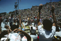 Flor de Pina, performers throwing gifts to spectators, 1982