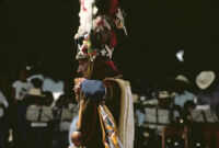 Saints Day, man wearing large headdress, 1982