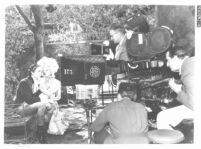 Lloyds of London: Tyrone Power and Madeleine Carroll park scene with director and film crew