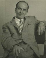 Lawrence C. Powell, seated portrait with arm draped on back of chair, 1960