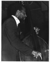 Percy Heath playing double base in the late 1970's [descriptive]