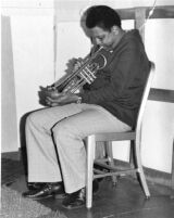 Bobby Bradford playing the trumpet, 1976 [descriptive]