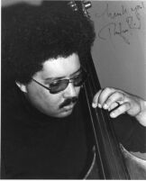 Autographed photograph of Rufus Reid playing bass in Los Angeles, 1979 [descriptive]