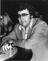 Frank Capp seated at a bar, 1979 [descriptive]